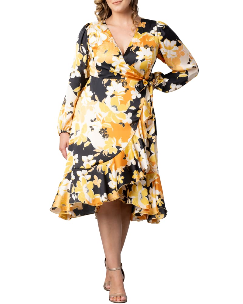 Front of a model wearing a size 2X Serena Satin Ruffle Wrap Dress in SUNSET BLOOMS by Kiyonna. | dia_product_style_image_id:316322